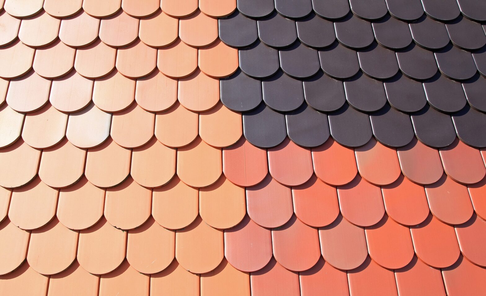 Close up image of multicoloured tiled roof